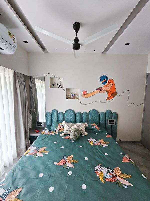 Kids' bedroom with a teal headboard and a cricket mural